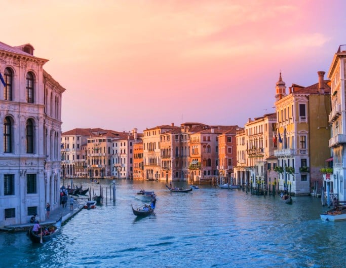 An ai enhanced color photo of lakeside buildings