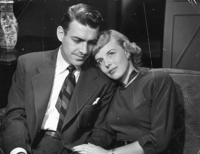 An original damaged black and white photo of a couple