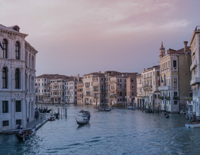 An original photo of lakeside buildings with dull colors