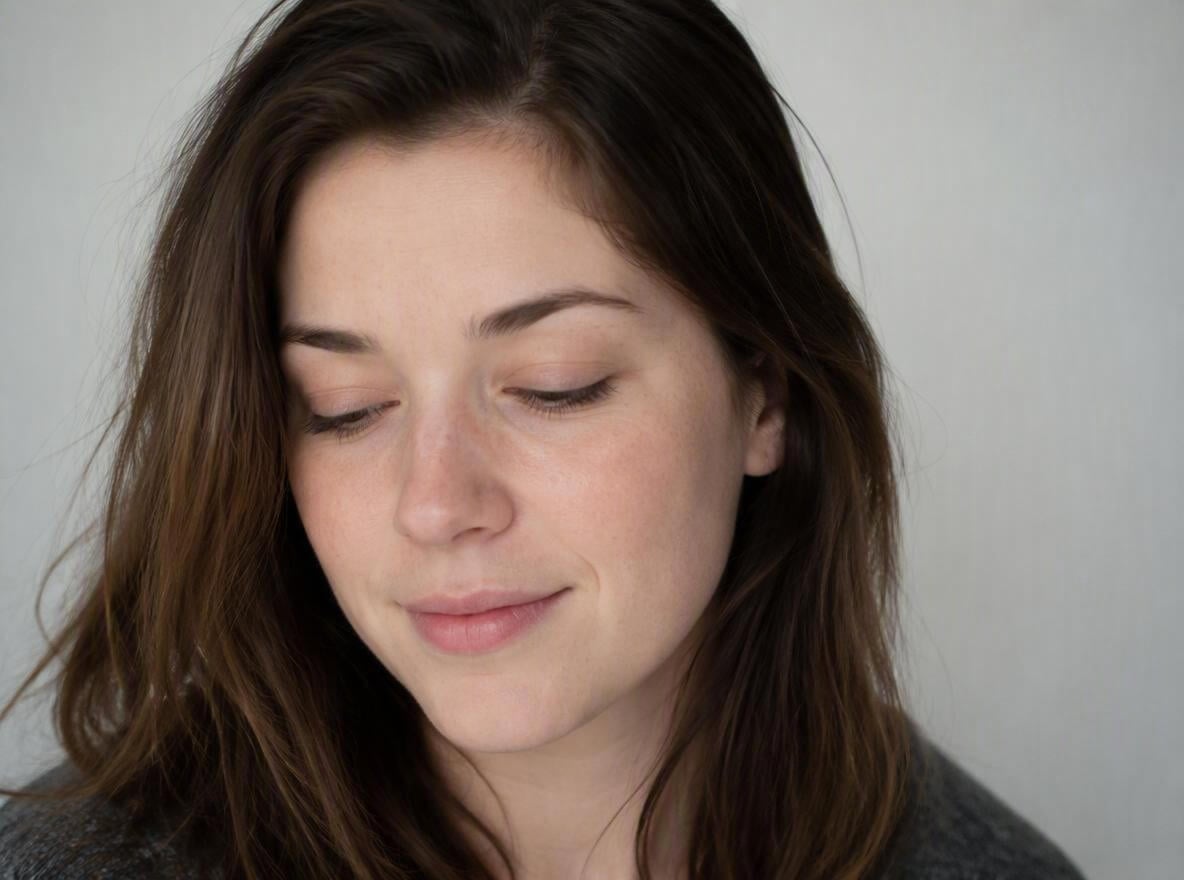 Beautiful woman with closed eyes in a portrait photo