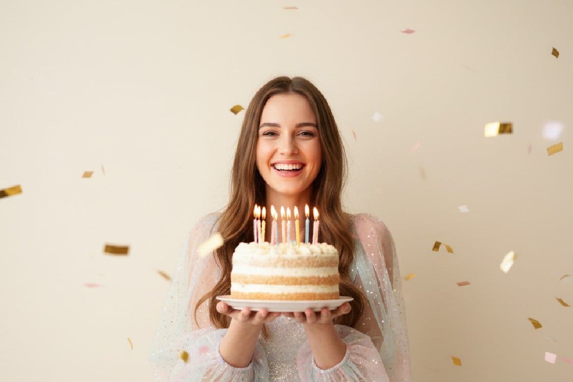 Before image featuring a woman with long hair holding a birthday cake