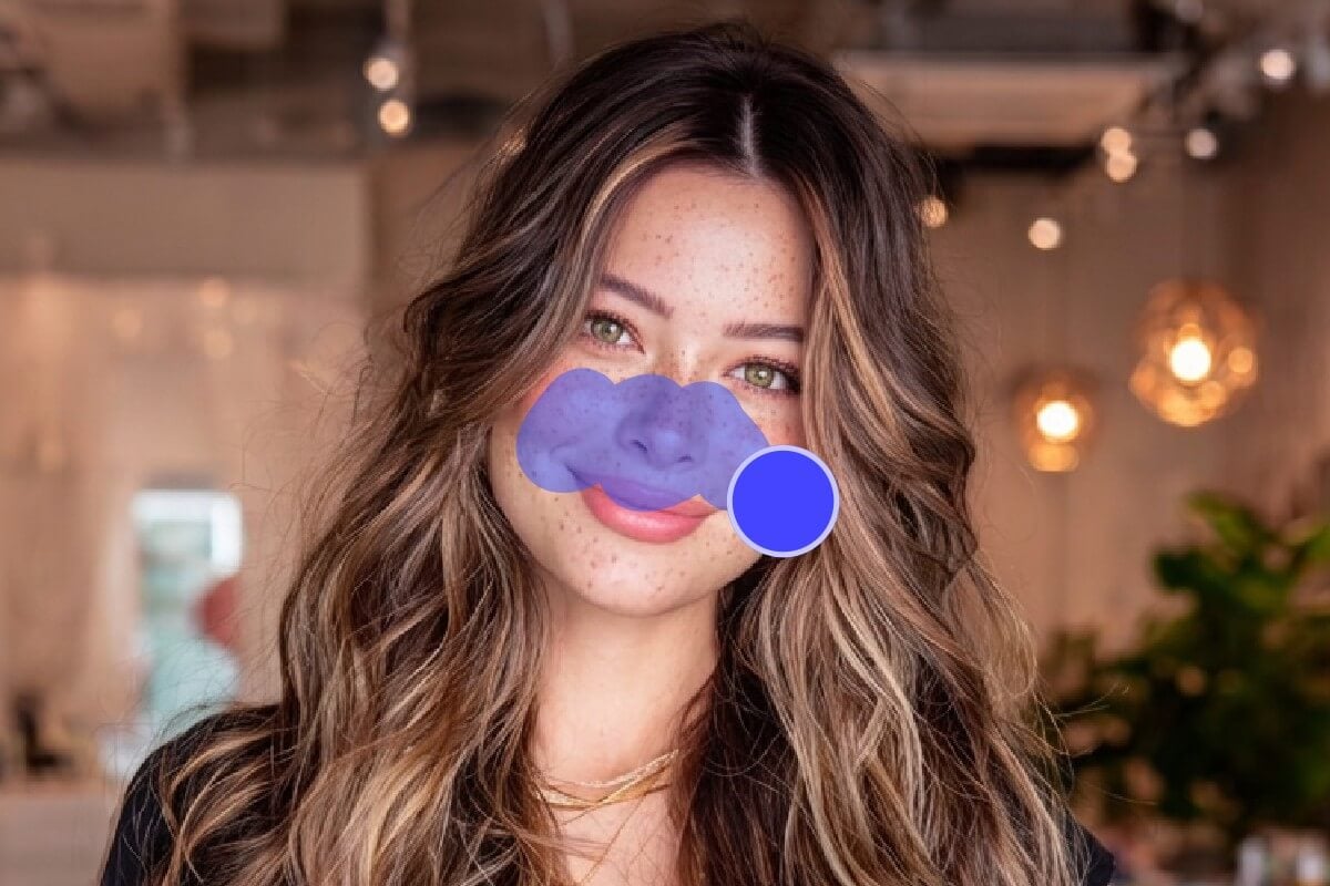 Manually remove blemishes on a photo of a woman with facial blemishes using the blemish fix tool