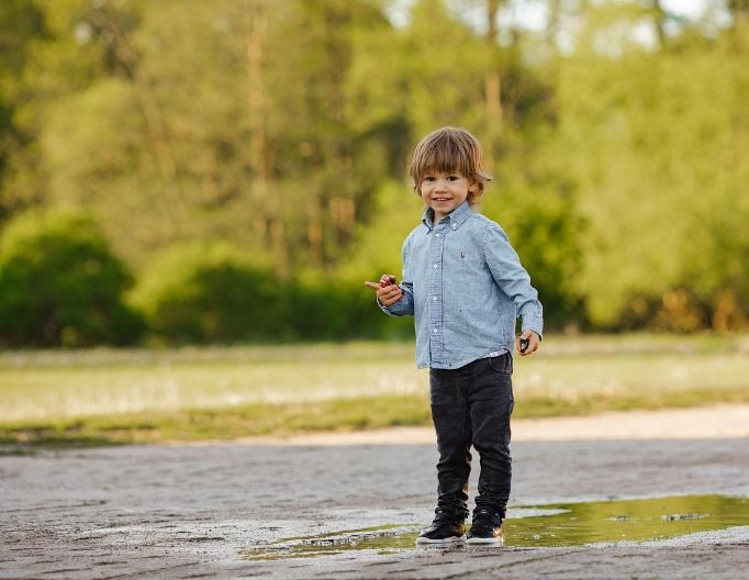 Original photo of a boy in a forest