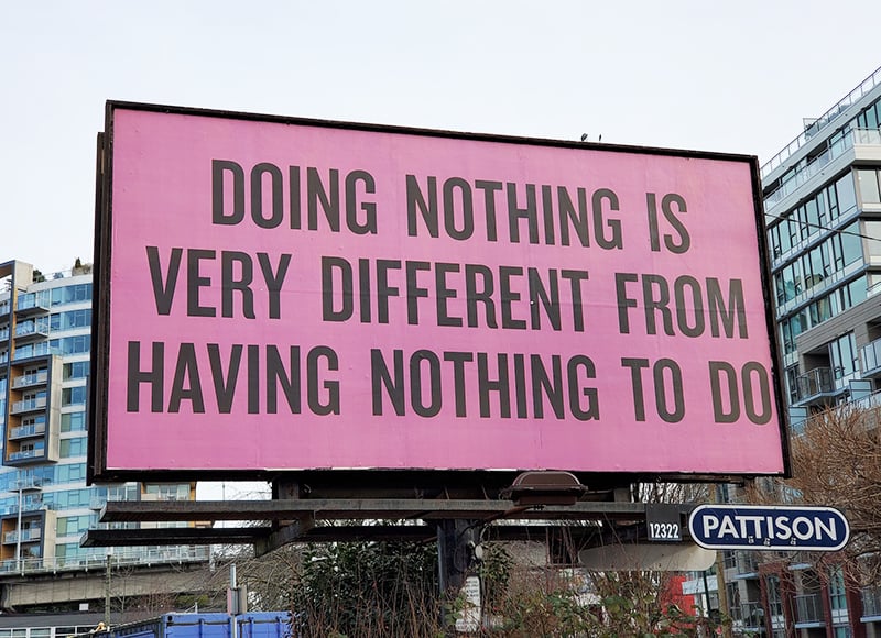 Pink billboard with text