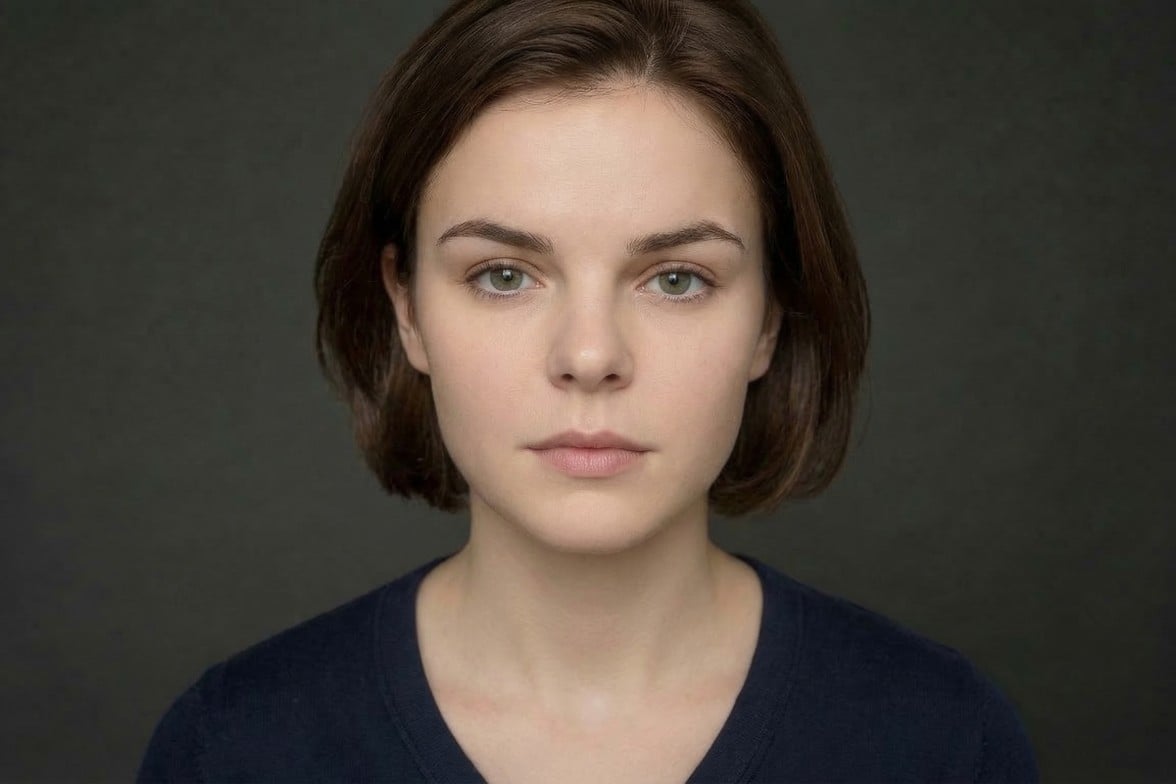 The original photo of a young woman with dark hair