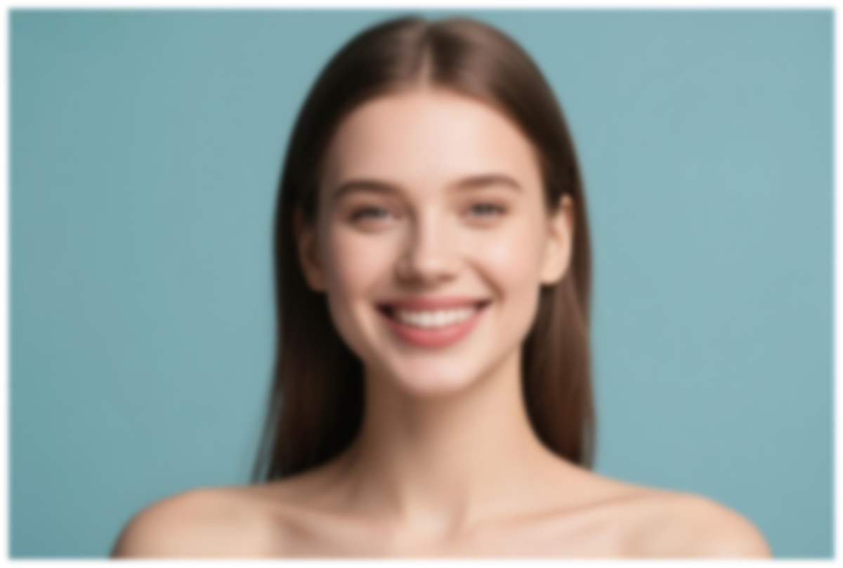 一張模糊的長髮微笑女性照片