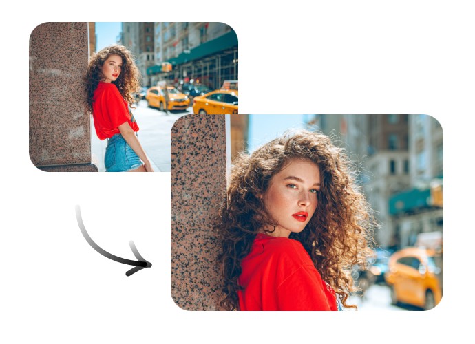 Zoom a photo of a lady with curly hair and in a red blouse